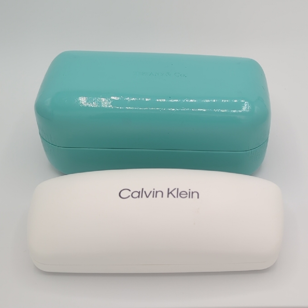 Tiffany & Co. sunglasses case, and Calvin Klein eyeglass case